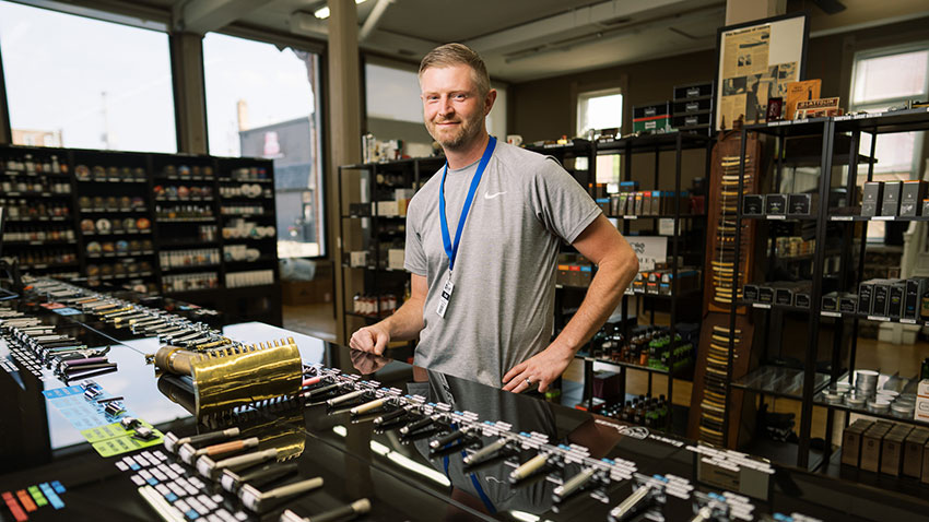 Brad Maggard sells razors in downtown shop